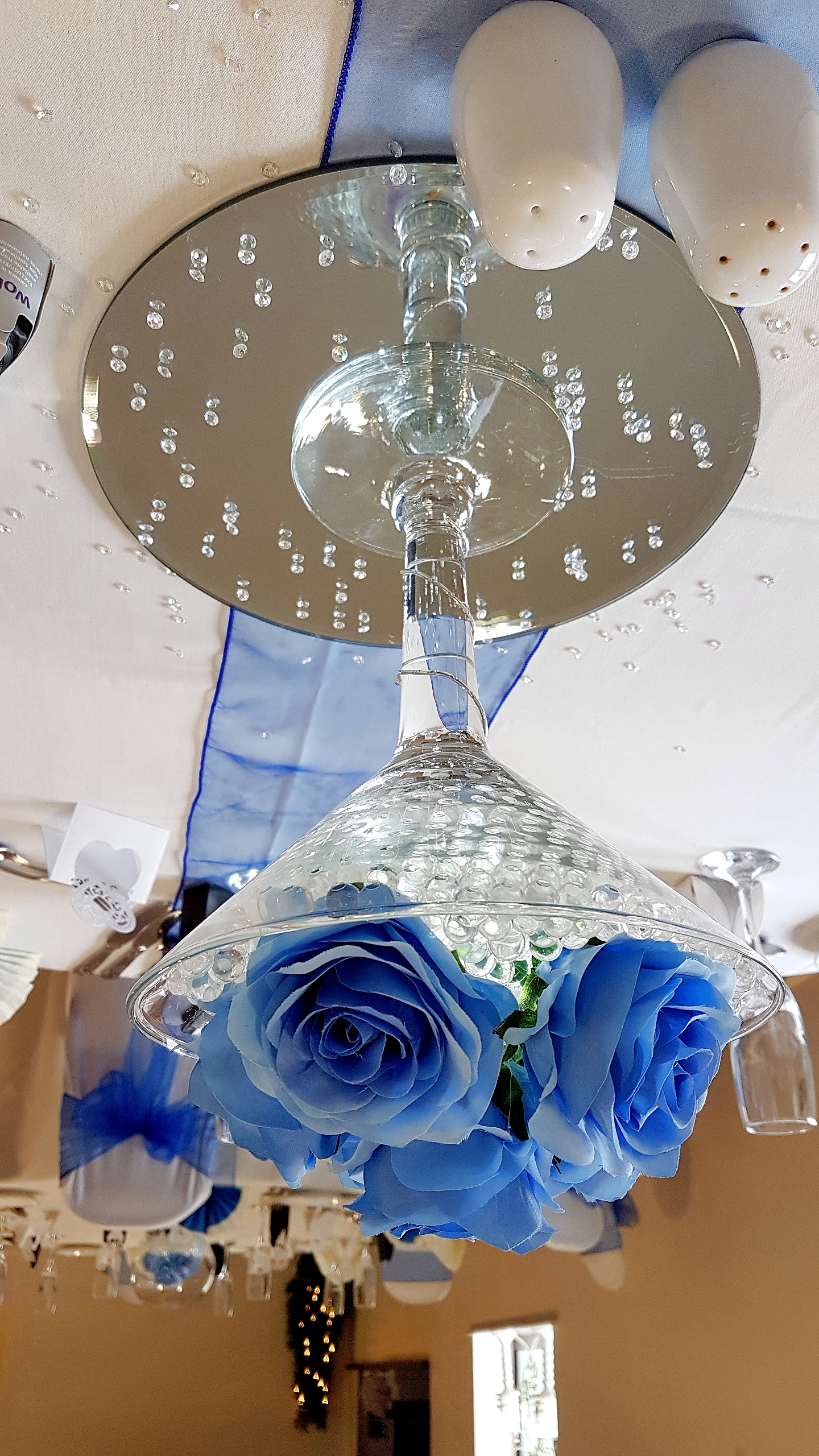 With Artificial Blue Roses.