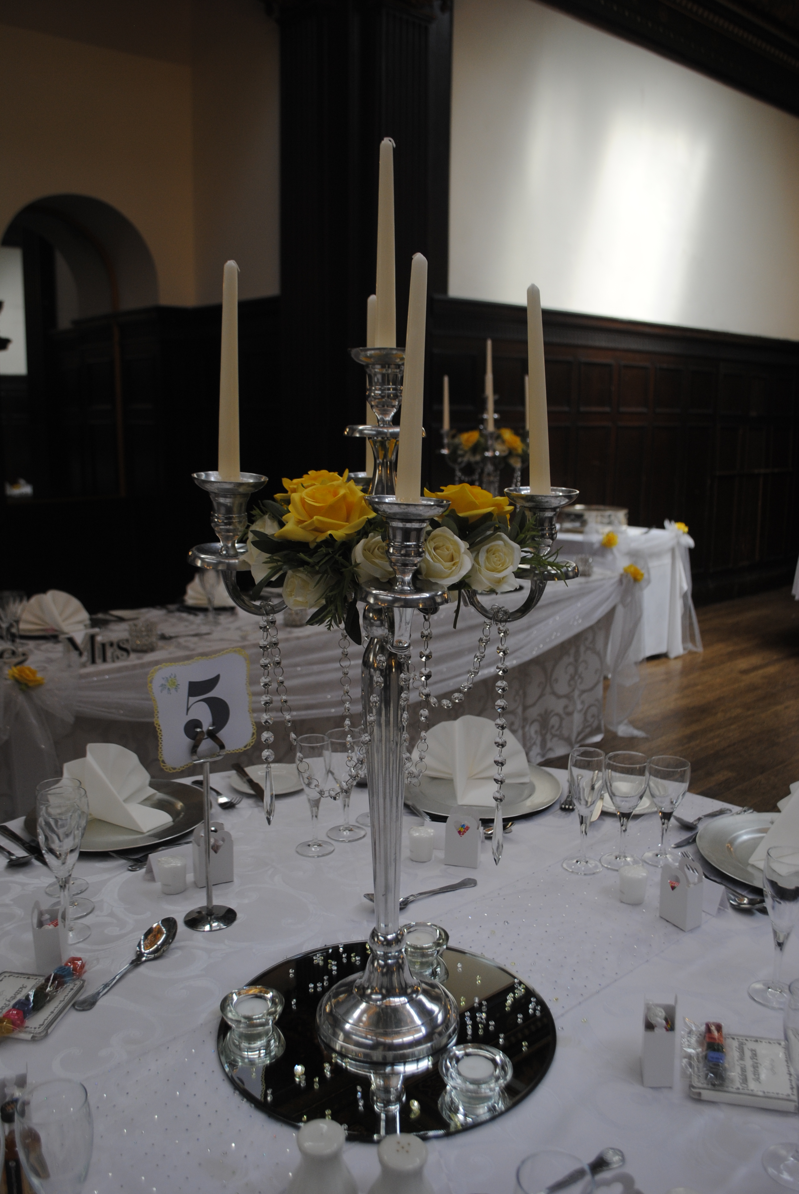 Candelabra with cream rose rings