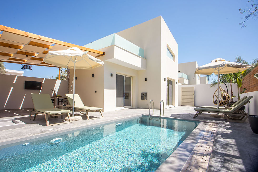 Wide angle view of a luxurious villa with a swimming pool