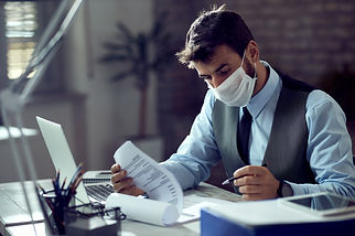 Male entrepreneur analyzing business rep