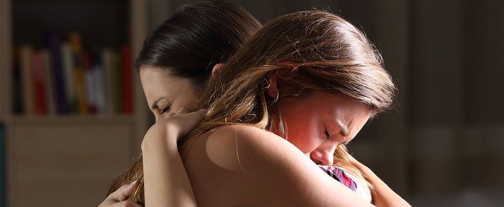 child grieving hugging parent