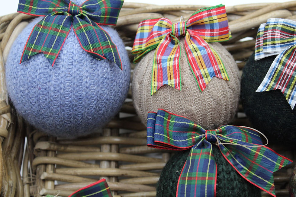 Thumbnail: Handmade woollen Christmas bauble using upcycled material.