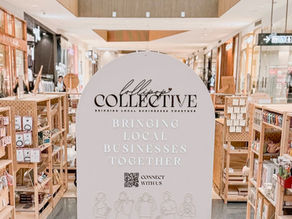 Mall display with a sign reading “Lollipop Collective - Bringing Local Businesses Together.”