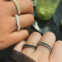 Handmade jewelry brand offering African-inspired jewelry, waist beads, and car- and anime-inspired stationery for unique personal style.