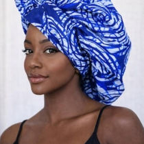 Hair care brand offering silk and satin bonnets, hair wraps, and loc caps designed to protect hair and reduce frizz.