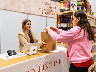 Customer shopping at the Lollipop Collective Ekka pop-up, supporting Australian small businesses at the Brisbane Ekka 2026.