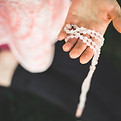 meditation beads in hand