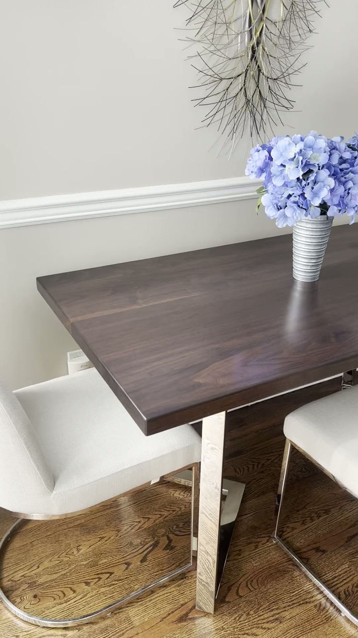 Video of the black walnut kitchen table and its polished chrome legs in Goldens Bridge, New York.