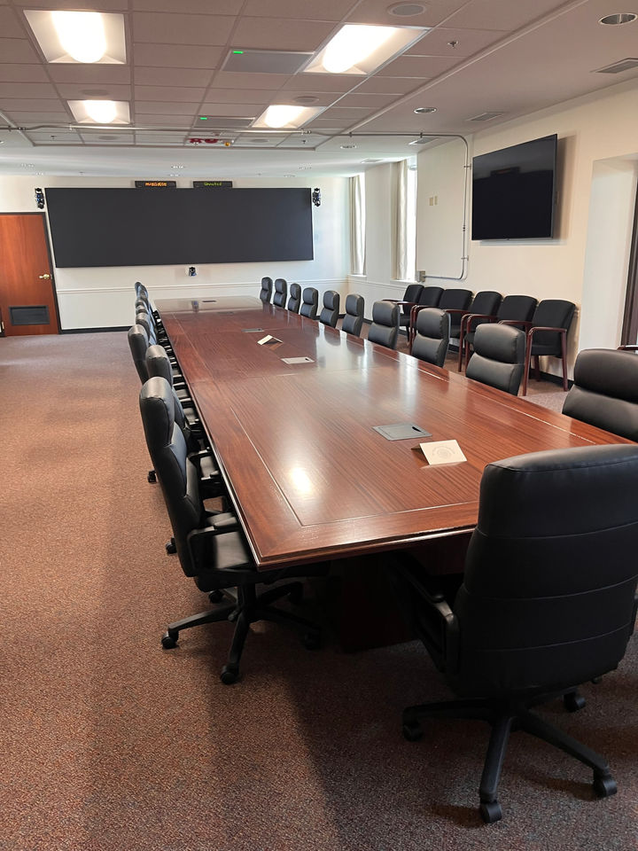 The full 30-foot Khaya mahogany conference table in the Cadet Command conference room at Fort Knox.
