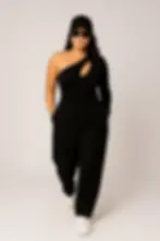 Woman in black one-shoulder jumpsuit with cutout Skynn
