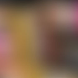 Hand holds "Dandelion is Dead" by Rosie Storey. Cover shows a woman in a flower field. Background: colorful books on shelves.