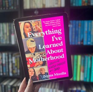 A hand holds a tablet showing a book cover titled "Everything I've Learned About Motherhood" by Zeena Moolla. Background: bookshelves.