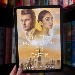 A hand holds a tablet displaying the book cover of "All the Moonlight on Earth" by Jesse Muehlbauer. Background shows bookshelves.
