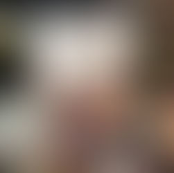 A hand holds the book "Shooting Up" by Jonathan Tepper, featuring a cover photo of three boys with a ball. Bookshelves are in the background.