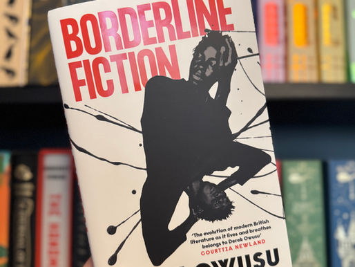 Hand holds "Borderline Fiction" book by Derek Owusu. Bold red and black design with a silhouette. Bookshelf background with colorful spines.