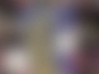 Hand holding a book titled "I Think We Should Kill Other People" by L.M. Chilton. Background shows colorful, blurred books on a shelf.