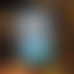 Tablet displaying "The ABC Murders" book cover by Agatha Christie, held in hand. Bookshelves in the background create a cozy ambiance.