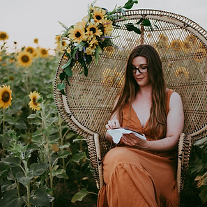Cross Stitching in Sunflowers