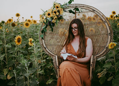 Cross Stitching in Sunflowers