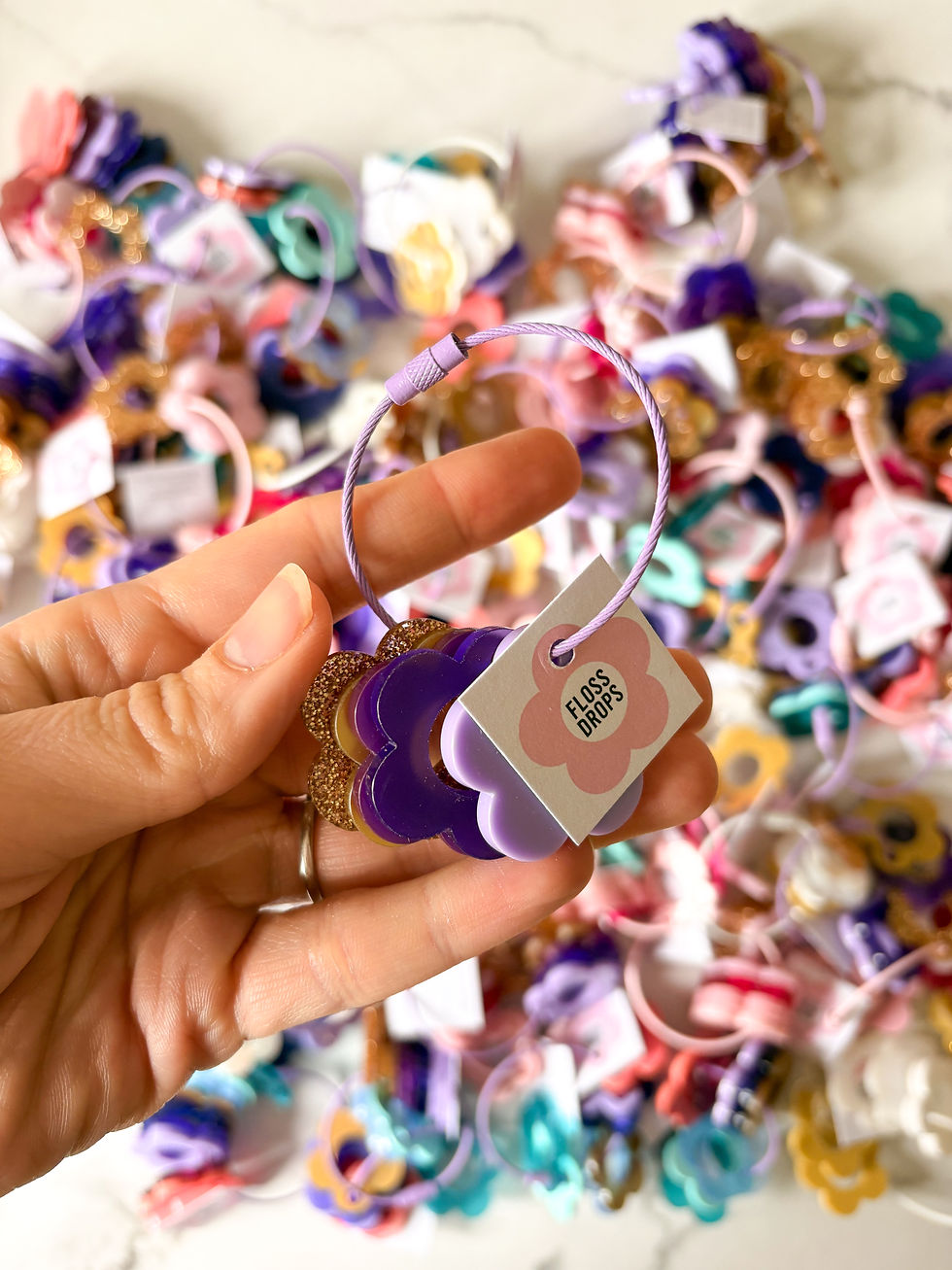 Thumbnail: Purple Wisteria Flower Floss Drops by Kate Blandford