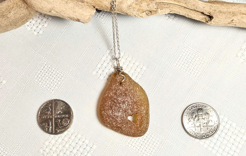 Thumbnail: Brown Sea Glass Heart Carved Silver Necklace