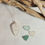 Thumbnail: White Sea Glass Hand Carved Hearts Necklace