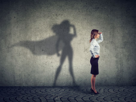 Woman with a superhero shadow