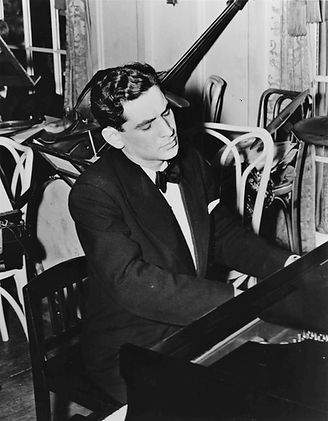Leonard Bernstein at the piano, courtesy