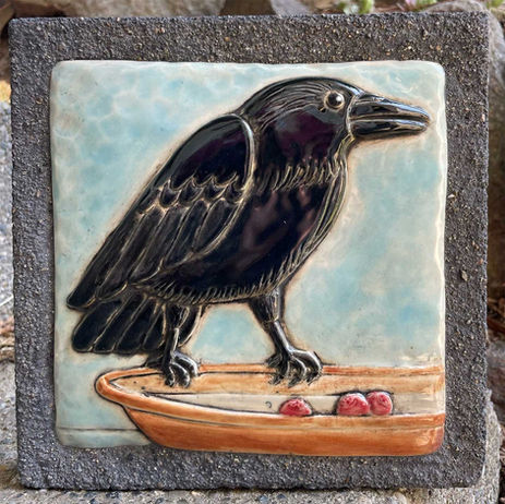 raven on ceramic wall or garden art