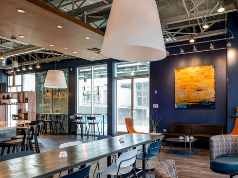 Commissioned painting by Debra Van Tuinen on the wall of Dancing Goats Coffee Bar in Buckhead, Atlanta
