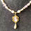 Thumbnail: Freshwater Pearl Beaded Necklace with oval cameo-style Pendant 2
