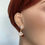 Thumbnail: Earring on a mannequin