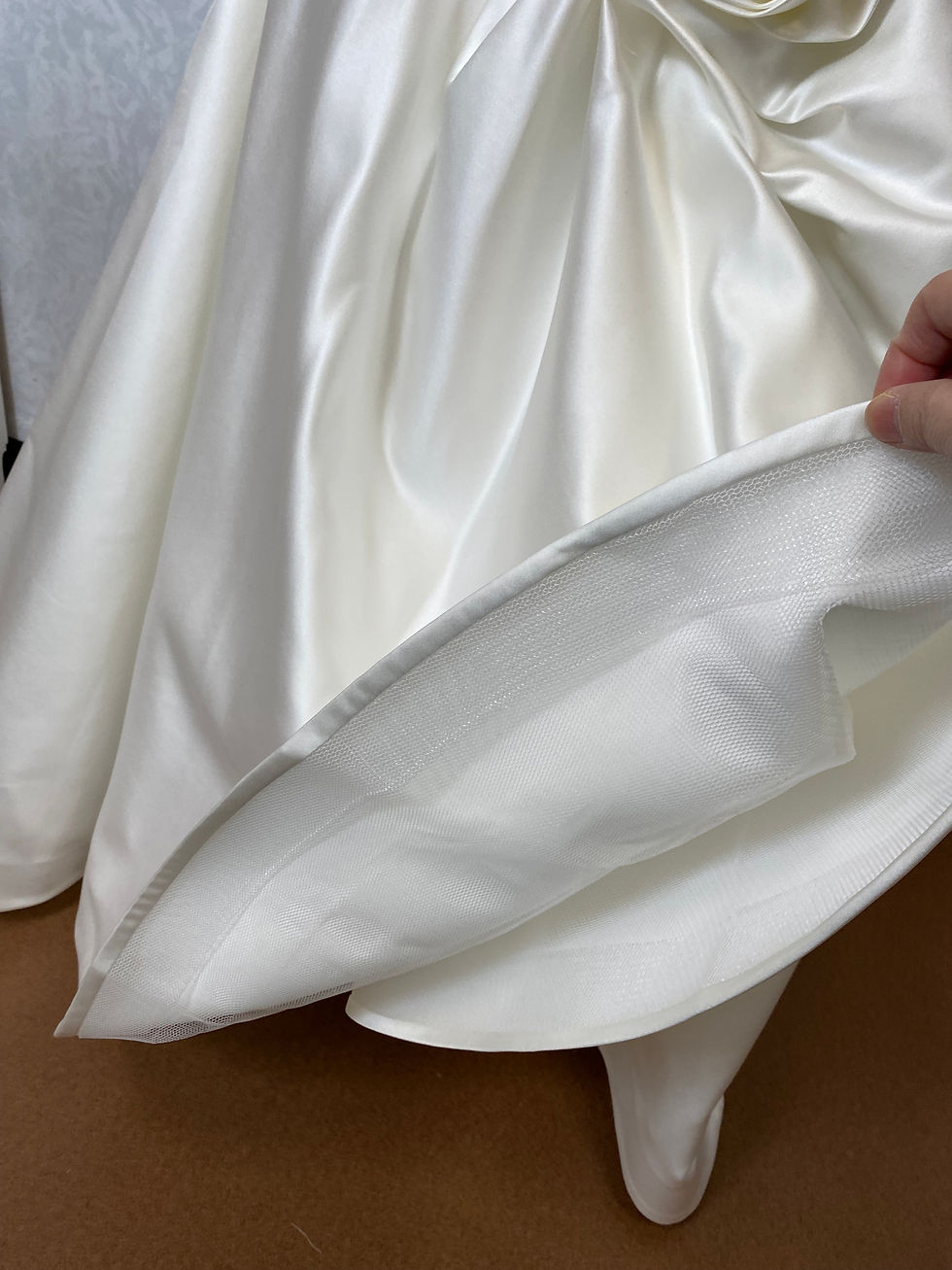 Thumbnail: Satin mermaid strapless gown on form insidedetail