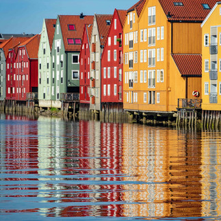 Colorful waterfront houses in Trondheim on FTLO's Scandinavia trip