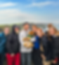 FTLO group posing in front of the majestic Cliffs of Moher overlooking the Atlantic Ocean