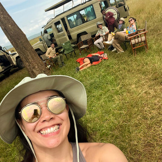FTLO traveler smiling on a game drive in Kenya