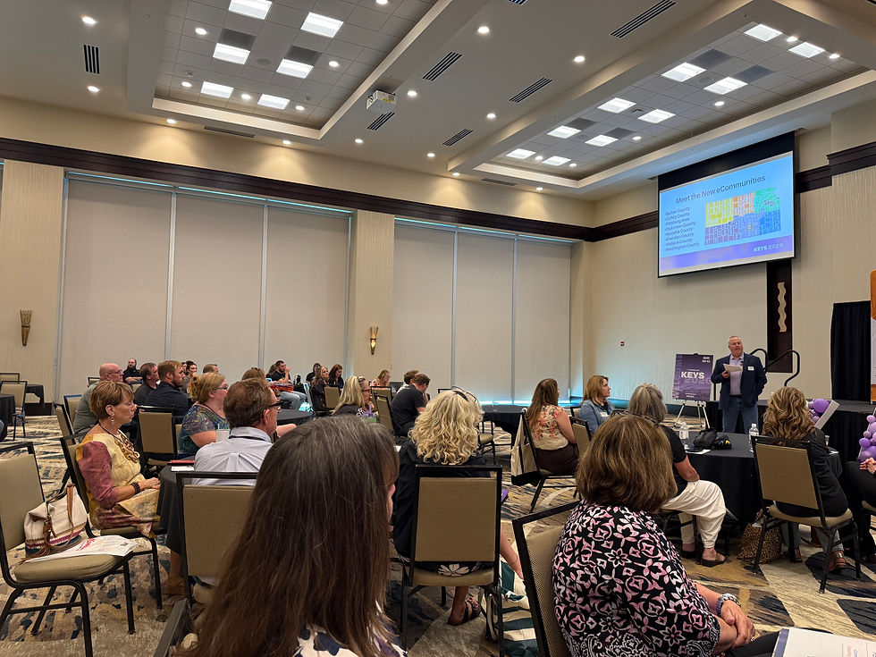 Erik Pedersen, President and Chief Operating Officer of Network Kansas, speaks to attendees seated in a conference room during the Kansas Entrepreneurship & Youth Summit.