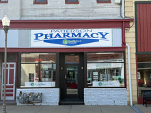Restored Patterson Healthcare Pharmacy storefront at 105 NW 3rd Street in downtown Abilene, Kansas.
