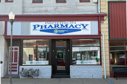 Restored Patterson Healthcare Pharmacy storefront at 105 NW 3rd Street in downtown Abilene, Kansas.