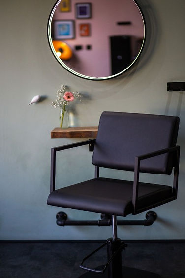 Styling chair and mirror at Cocking Baker Hair salon Birmingham