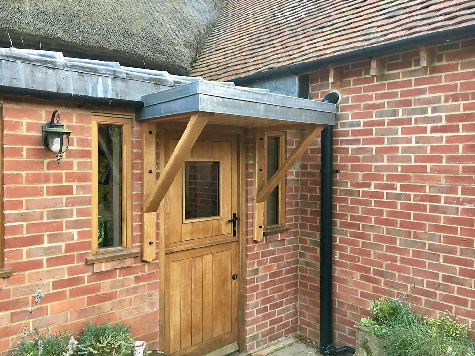 Oak gallows bracket porch