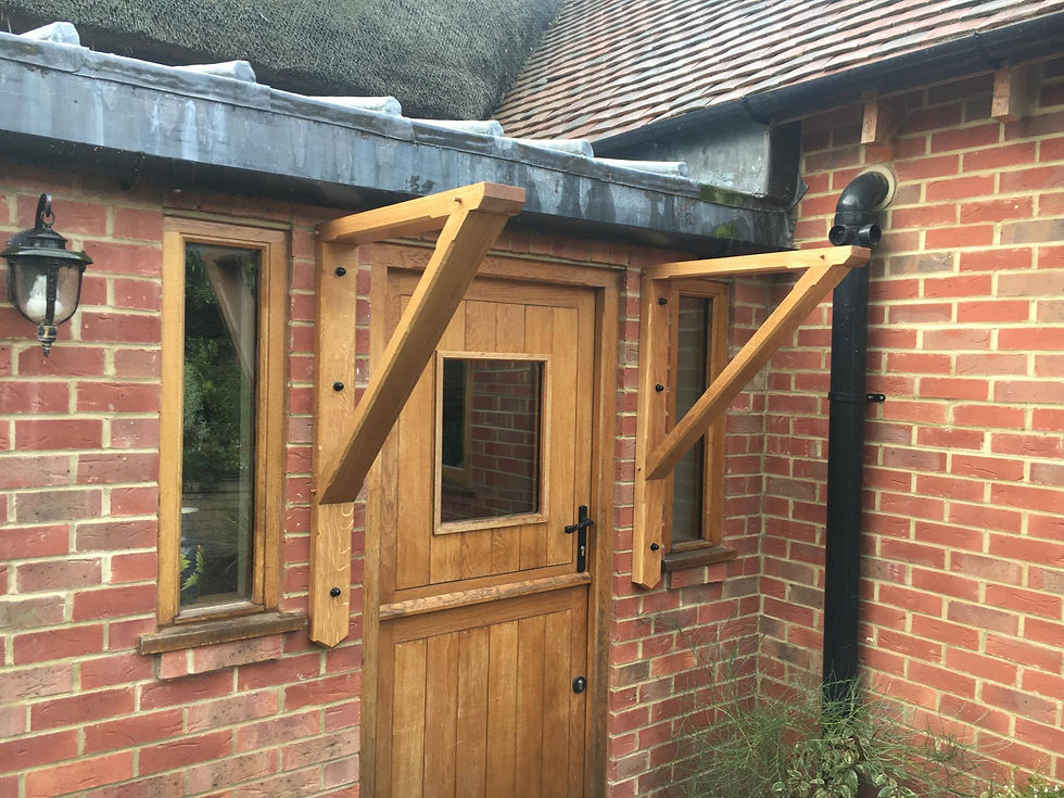 Oak gallows bracket porch