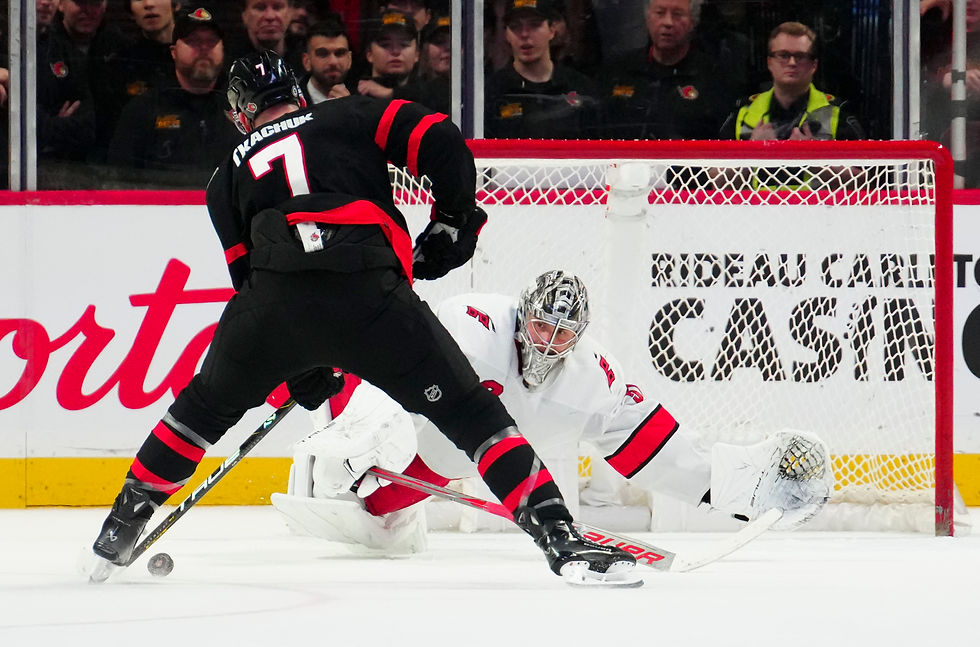 Carolina Hurricanes goaltender Pyotor Kochetkov poke checks Ottawa Seantor Brady Tkachuk