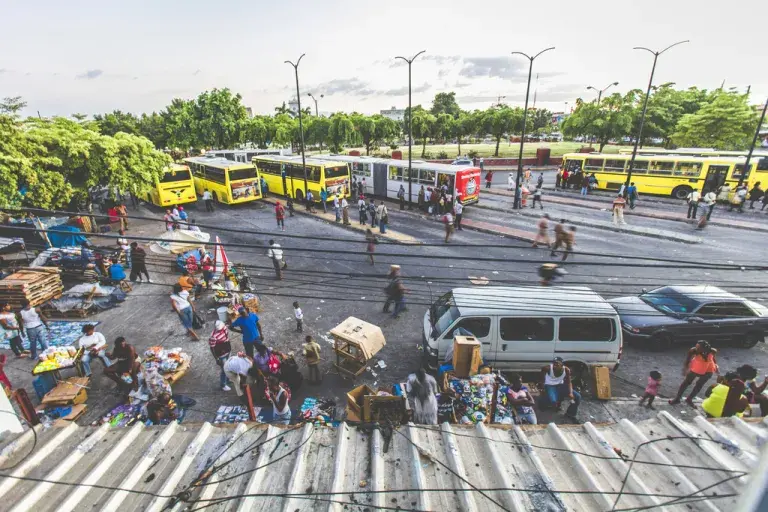 Evening rush with street vendors and bus station just before sunset in Kingston downtown near the market area. (iStock.com/peeterv)