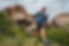Male runner running on a mountain trail. Athlete runs in the mountains among the rocks. Ma