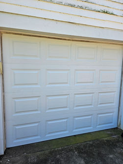 Top-Notch Garage Doors LLC., of Greensboro North Carolina - Clopay 9x7 Non insulated white short panel garage door install