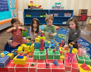 children playing with different types of blocks