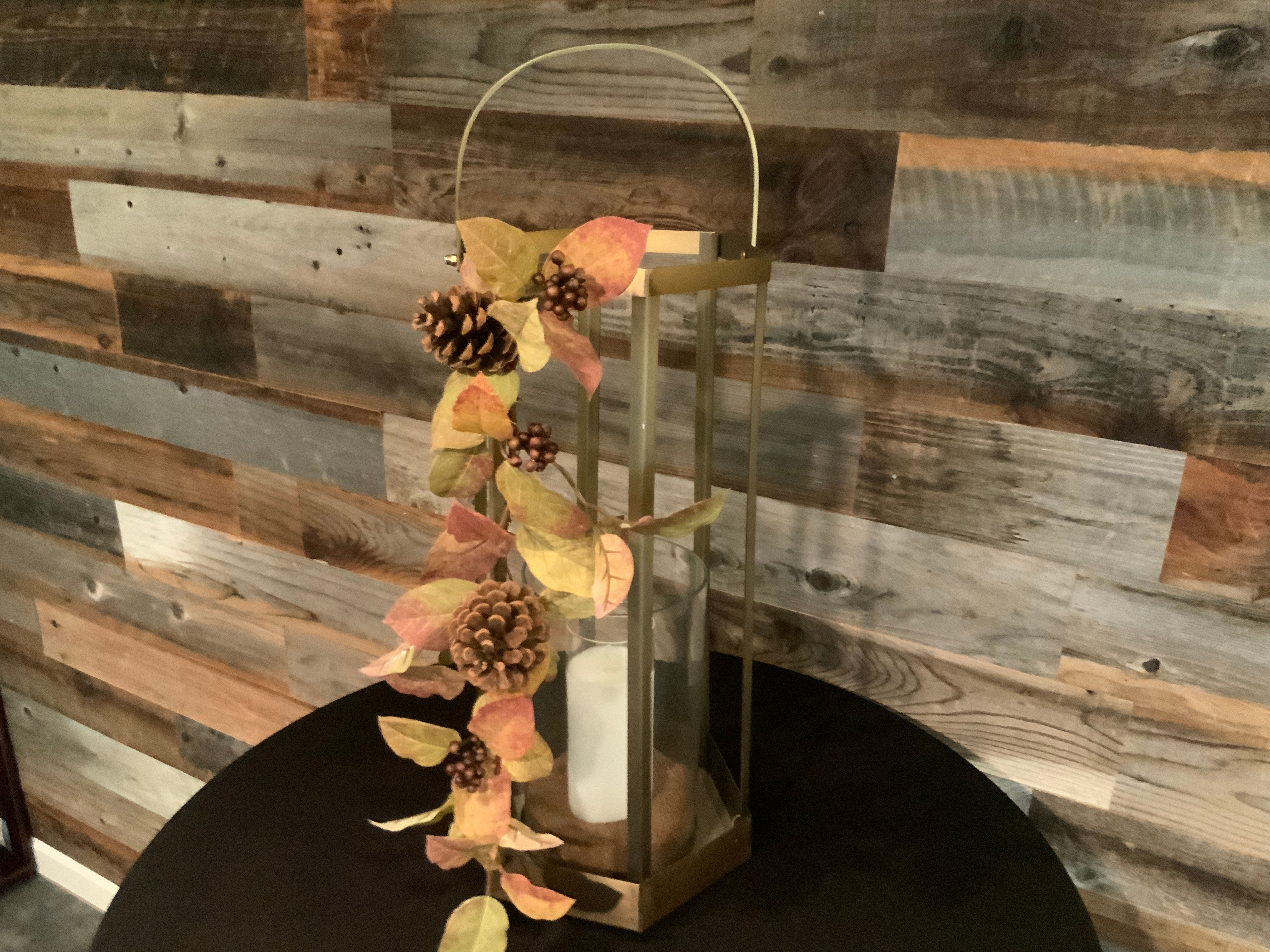 Brushed gold open lantern w/ Fall garland and flicker battery candle