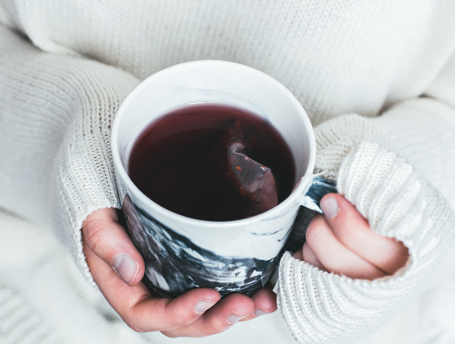 Holding A Tea