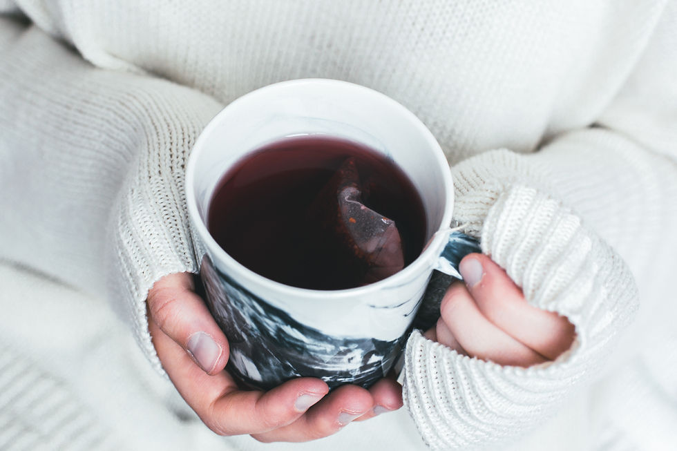 Holding A Tea